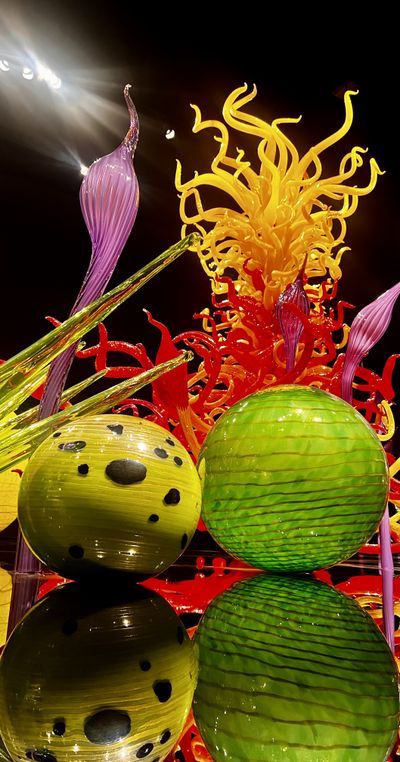 Glass sculpture with dramatic lighting